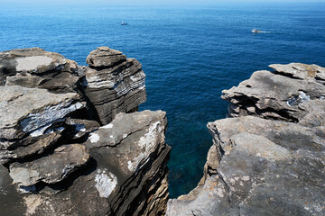Peniche cliffs near Cabo Carvoeiro with sedimentary carbonate rocks from the jurassic in Portugal, Europe