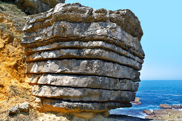 Peniche cliffs near Cabo Carvoeiro with sedimentary carbonate rocks from the jurassic in Portugal, Europe