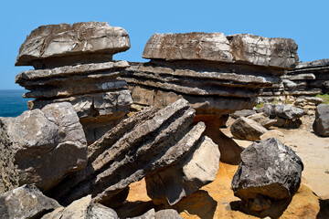 Peniche cliffs near Cabo Carvoeiro with sedimentary carbonate rocks from the jurassic in Portugal, Europe