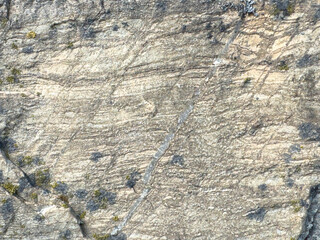Natural rock texture with subtle patterns and earthy tones