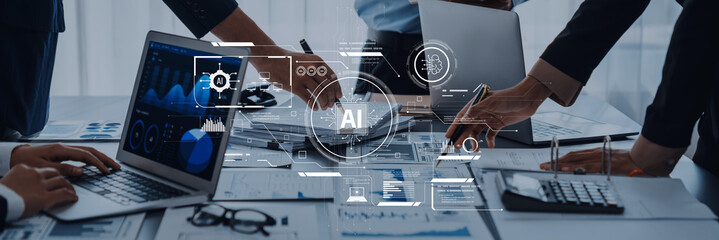 A corporate team collaborates on an artificial intelligence project, utilizing data and technology in a modern office setting to enhance productivity and innovation. Trope