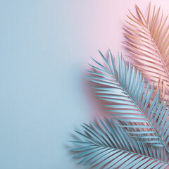 Painted palm leaves on pastel pink and blue background with copy space. Tropical summer concept. Minimal flat lay. 