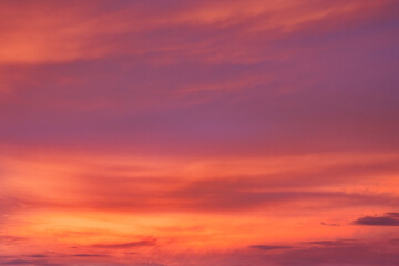  Stunning Layered Orange and Pink Sunset Sky with Ethereal Clouds in Vibrant Twilight Hues