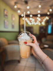 Iced latte with whipped cream