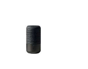 A simple, dark gray cylinder-shaped portable speaker, highlighted against a black background, exudes a modern and minimalist aesthetic.