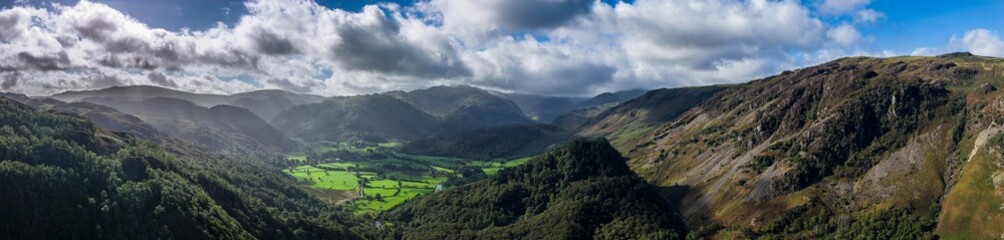 Fototapeta premium Borrowdale Valley Panorama Over Lake District Green Valleys And Mountain Ridge Under Cloudy Sky