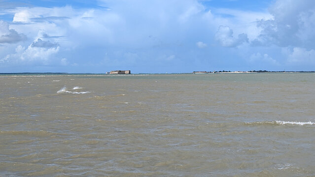igh tide at Fouras beach with view of Fort Enet andFort Boyard. 