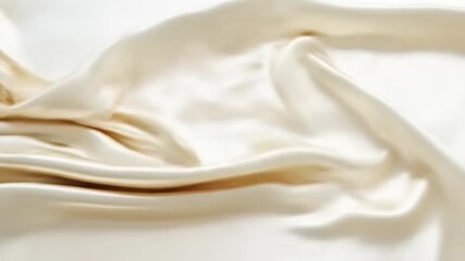Luxurious folds of champagne-toned silk fabric create a smooth and elegant texture. - Powered by Adobe