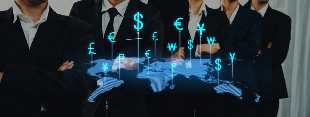 A professional group of men in suits stands confidently, with a digital map and currency symbols...