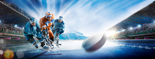 Professional forward player masterfully puck. Breaks defense, ready to hit the puck with stick to...