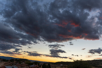 Pink clouds over the village of Mora de Rubielos at sunset, Teruel, Aragon, Spain