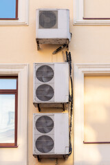 Air conditioners on the facade of the house, ventilation and cooling system, air purification technology. split system.