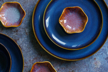 The flat lay composition of ceramic dishes. 
