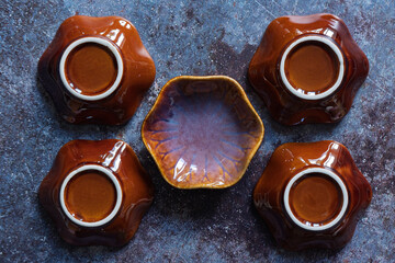 The flat lay composition of ceramic dishes. 