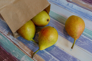 Pears in a paper bag.