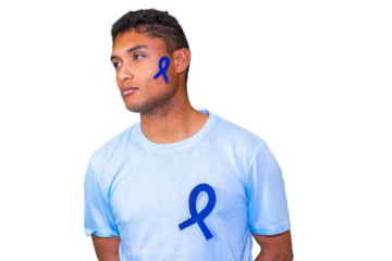 Young man showing blue ribbon for colon cancer awareness month, prostate cancer awareness and chronic fatigue syndrome.