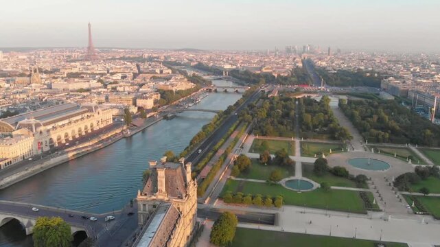 An aerial view captures the seine river flowing through the heart of paris