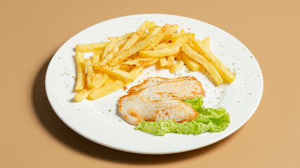 Roasted chicken breast and fries