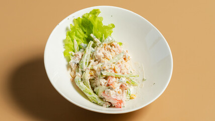 Olivier salad bowl top view isolated