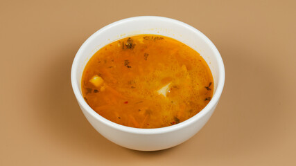 Chicken soup bowl isolated top view