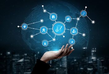 A visually striking graphic featuring a hand holding various digital icons, symbolizing global connectivity and innovation in technology and communications. Tessel
