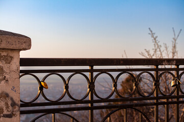 A backdrop with an openwork lattice and sunset sky for product placement