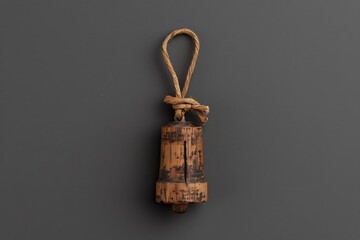 Traditional wooden spinning top with rope high resolution picture