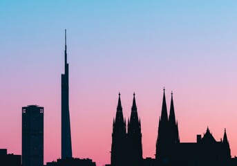 Obraz premium Pastel sky with landmark silhouettes