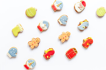 Set of different Christmas and New Year gingerbread cookies on white background, top view