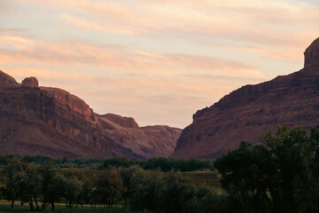 Vibrant rock formations at dusk creating a picturesque view of nature.