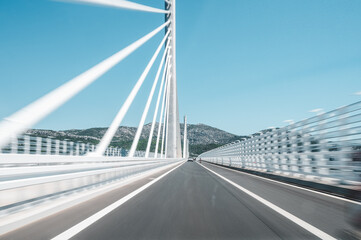 Fototapeta premium Speeding across Pelješac Bridge Croatia scenic cable stayed highway fast driving