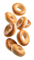 Falling bagels with sesame seeds isolated on transparent background, a delicious and versatile bread for breakfast, lunch, or snack, a bakery staple