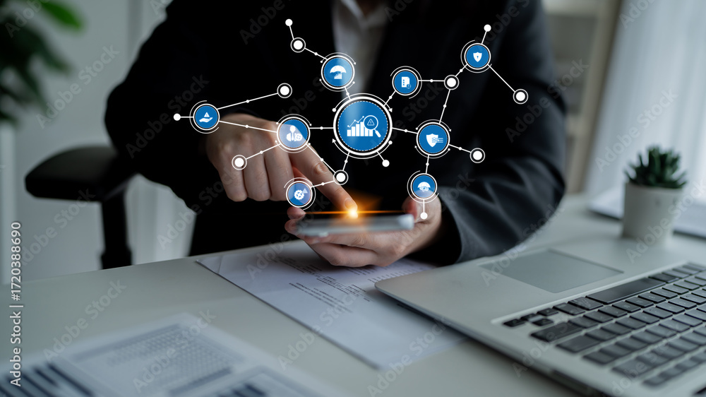 Aufkleber a business person interacts with a smartphone displaying a digital interface. icons symbolize data, 