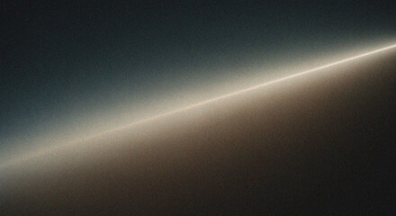 Minimalist abstract background with a soft diagonal light beam