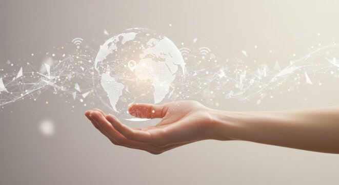 Hand holding a glowing globe with abstract connections in a bright setting.