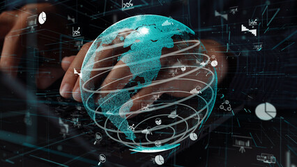 A close-up view of hands typing on a keyboard, with a luminous globe overlay showcasing various graphs and charts, symbolizing global data analysis and digital technology. Xenic