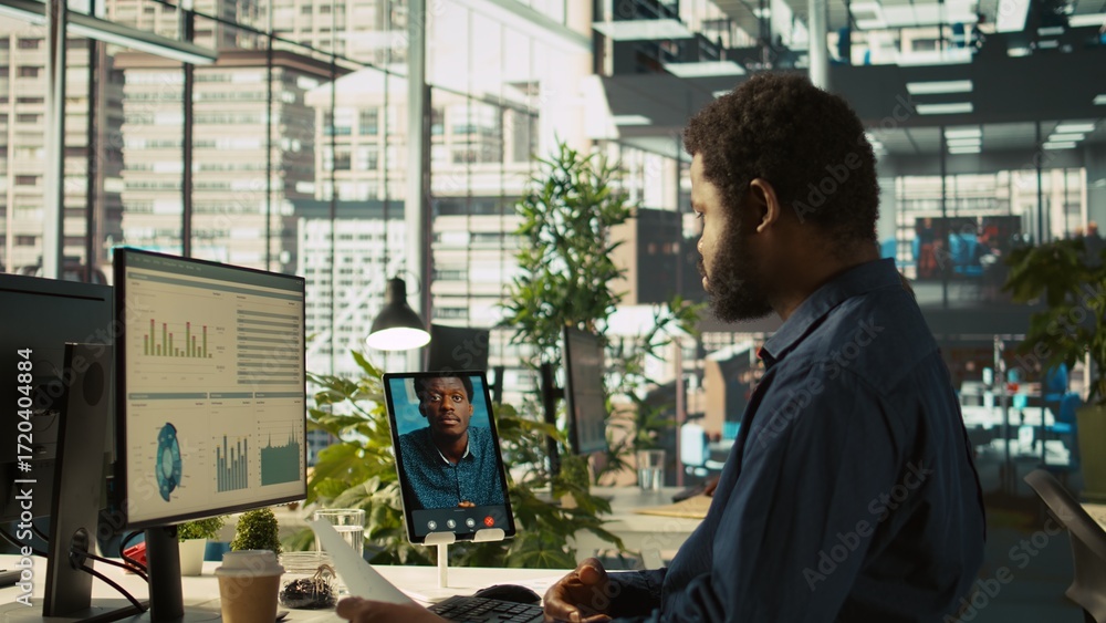 Poster manager chatting with worker in videoconference, setting goals for performance and company growth. m