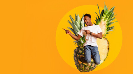 An excited african man jumps joyfully against a bright yellow backdrop. He points with enthusiasm, showcasing his energy and positivity. His expression reflects a sense of adventure and fun.