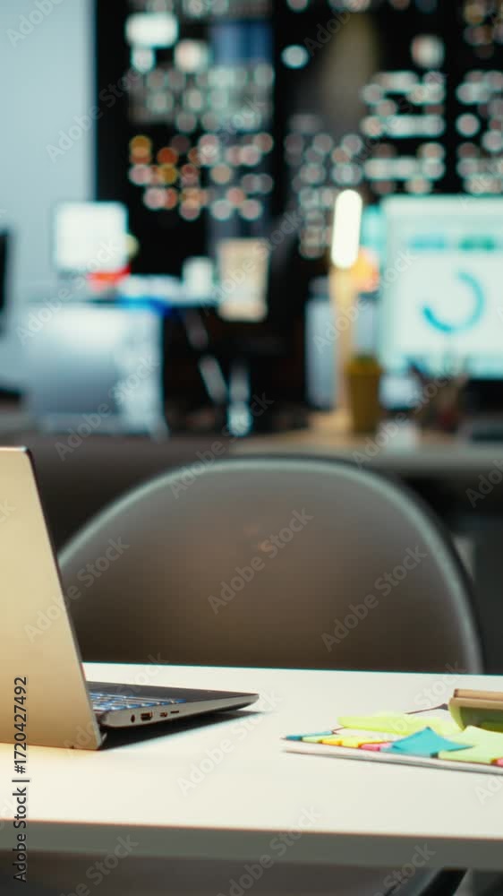 Poster vertical video empty business office at night showcasing data reports and analytics, midnight glow a