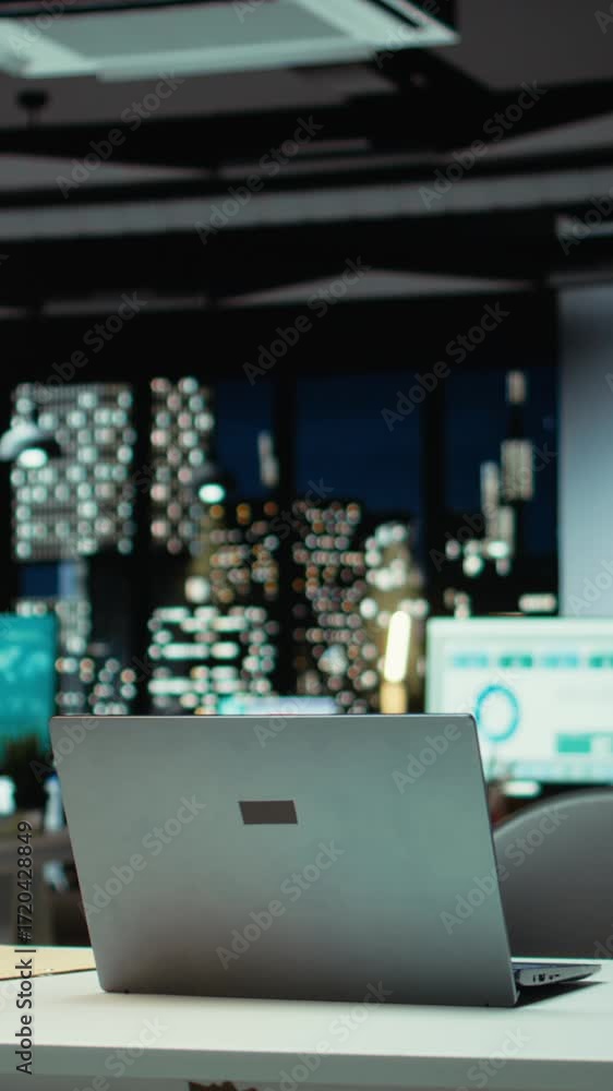 Poster vertical video high end empty office features laptop and monitors for forecasting. modern space set 