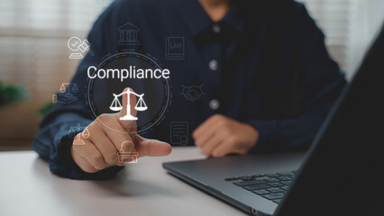 Corporate compliance concept with businessperson using digital system for law, regulation, and governance. Suitable for risk management, legal process, and organizational accountability solutions.