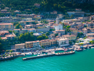 Limone sul Garda old town. Aerial view of panoramic Garda lake and Italian Alps mountains. Lombardy drone landscape of downtown