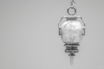 Vintage metal lantern showcasing elegant craftsmanship and historical significance coupled with modern minimalism embodying timeless beauty and functional design