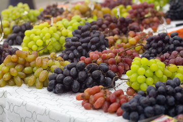 Various grape varieties on the market counter