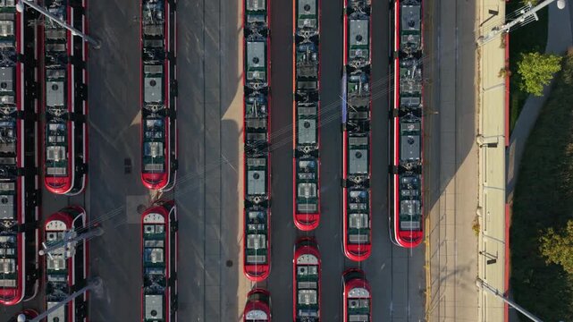 Overhead pass of streetcars parked at a storage facility