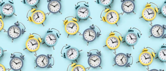 Alarm clocks on blue background