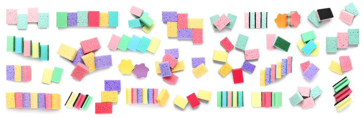 Set of many housework sponges on white background