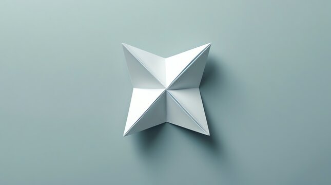 White origami fortune teller on a pale blue background