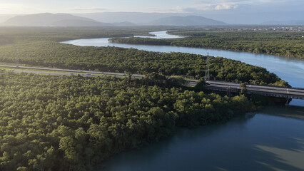 Sunset River At Itanhaem In Sao Paulo Brazil. Atlantic Forest Landscape. River Skyline. Tropical Travel. Sunset River At Itanhaem In Sao Paulo Brazil. Outdoor Sunset.
