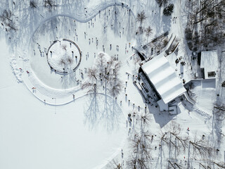 View of the skating rink and downtown in winter from Mont Royal, Montreal. Quebec, Canada